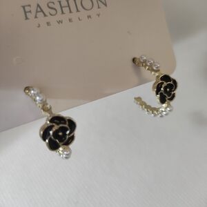 Elegant Black and Gold Floral CC Earrings With Faux Pearl Accents